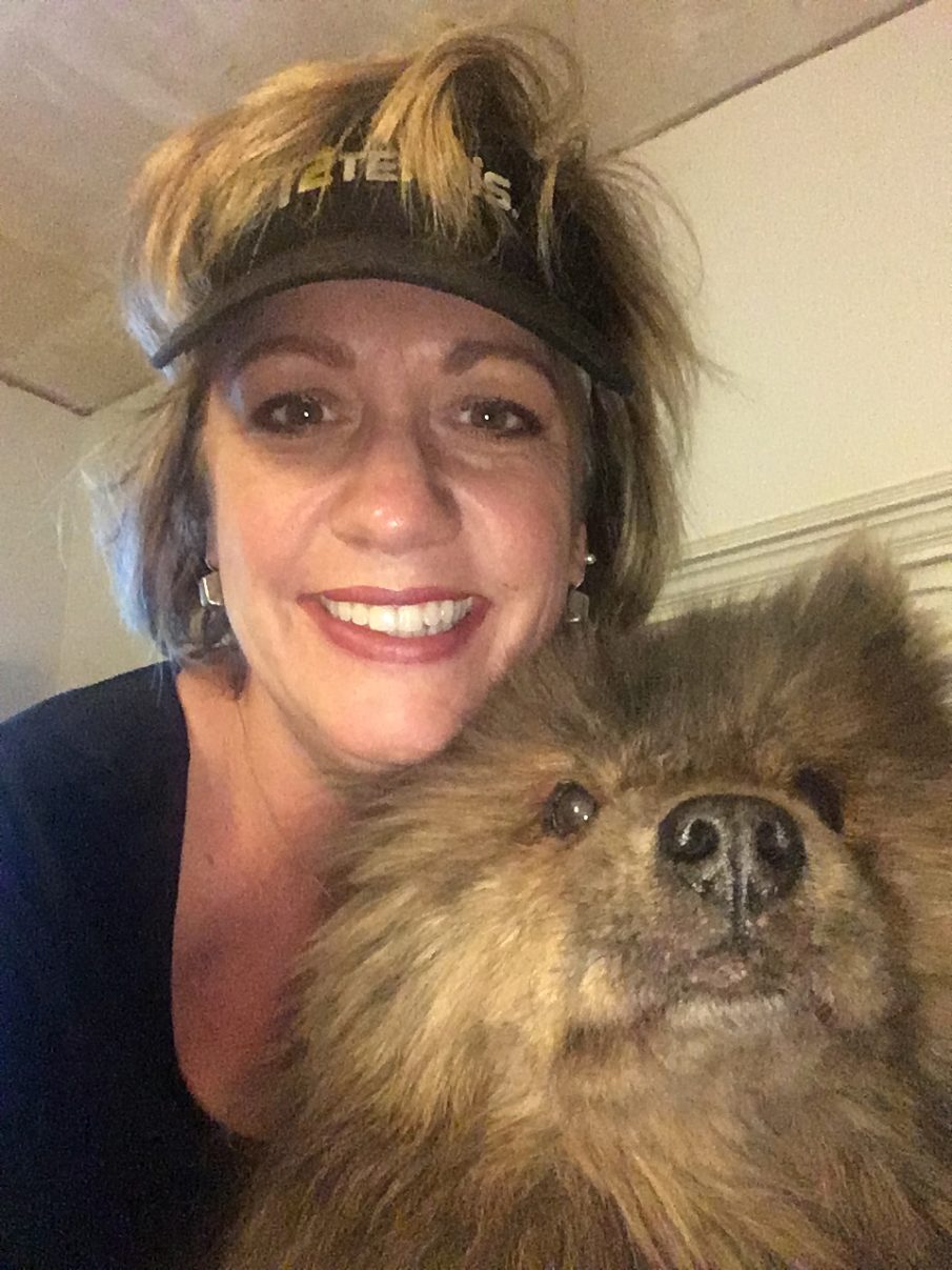 close-up picture of Jena and Lucy, a brindle Chow Chow