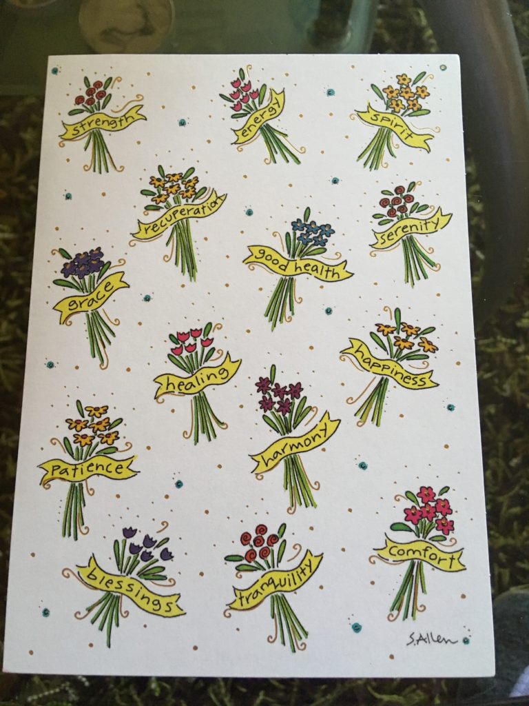 front cover of card with positive words and flowers