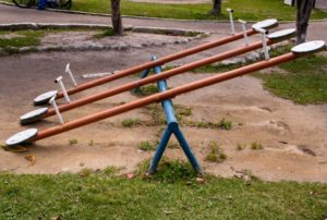 picture of three old teeter totters